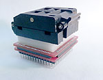 100 QFP adapter with hinge lid test ZIF QFP socket on a .1 inch hole pattern male pin breadboard pattern.
