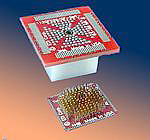 Aprilog SMT Component carriers have surface mount pads on one side and female pin receptacles on the other so that surface mount components can be quickly and easily changed on a circuit board without soldering.