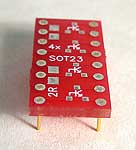 2 SMT Resistor or Capacitor sites and 4 SOT23 transistor package sites to 300 mil DIP pin rows adapter.