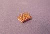 SOIC 14 pin array base for SMT Pads provides access for test socket attachment.