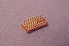 SOIC 20 pin 0.65 mil pitch grid array base for SMT Pads provides access for test socket attachment.