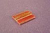 SOIC 28 pin array base for SMT Pads provides access for test socket attachment.