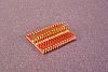 SOIC 28 pin array base for SMT Pads provides access for test socket attachment.
