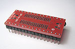 32 pad SOIC package to DIP breadboard adapter  converts SMT package with pitch of 50 mils to two 600 mil DIP pin rows.