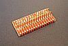 SOIC 32 pin array base for SMT Pads provides access for test socket attachment.