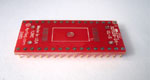 32 pad TSOP Type 1 package to DIP breadboard adapter converts 20mm SMT package with pitch of 0.5mm (20 mil) to dual inline pin rows. DIP pin 1 is connected to TSOP pin 9 and DIP pin 32 is connected to TSOP pin 8 so that the TSOP Type 1 package on this adapter can be plugged directly into a DIP socket for the same chip in a DIP package.