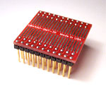 44 pad SOIC package to 100 mil breadboard adapter converts SMT package with pitch of 50 mils to four pin rows.