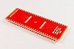 56 pad TSOP package to DIP breadboard adapter converts SMT package with pitch of 5 mm to DIP pin rows.  DIP pin 1 is connected to TSOP pin 15 and DIP pin 56 is connected to TSOP pin 14 so that this adapter can be plugged directly into a DIP socket for the same chip in a DIP package.